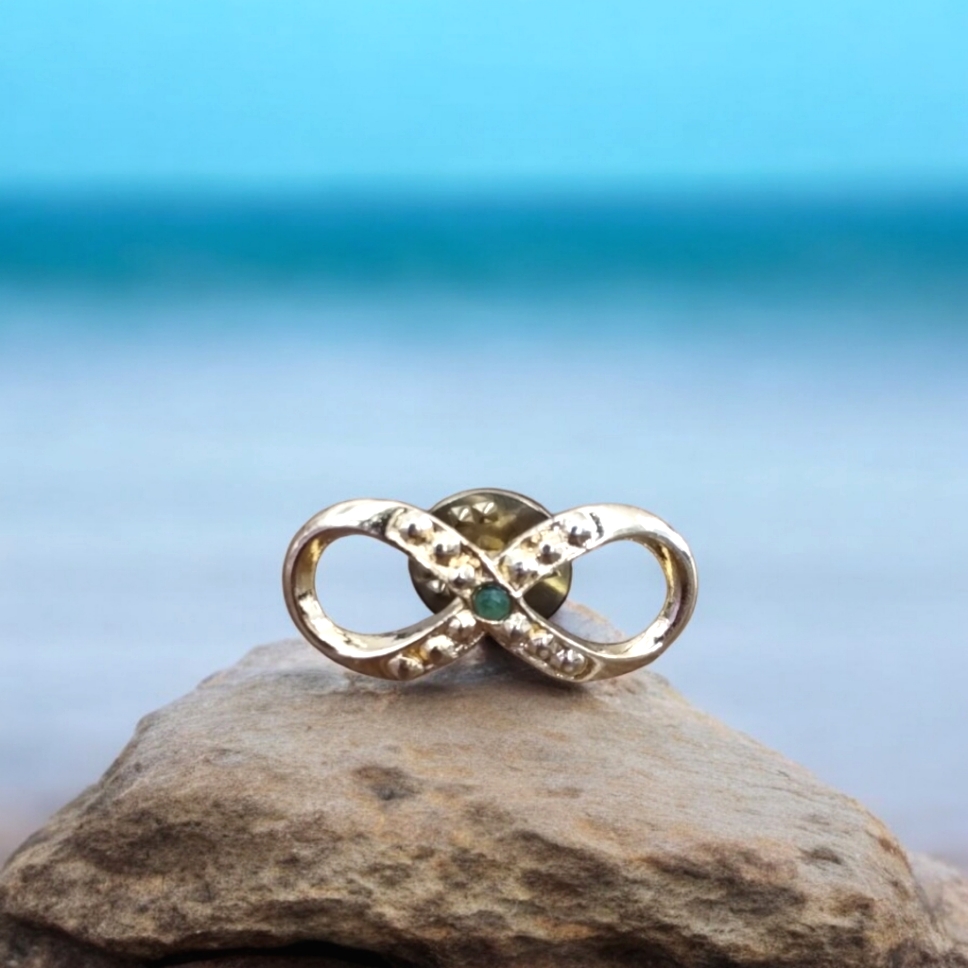 Vtg Hattie Carnegie Gold-Tone Infinity Pin With Green Gem